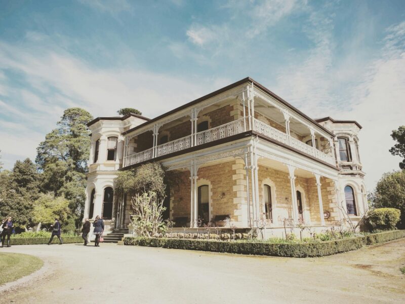 Large Victorian homestead with gravel driveway