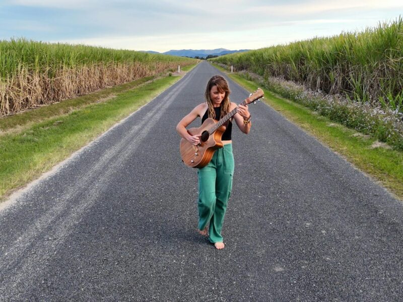 Majelen on promo picture for her long way to go tour in the cane fields in northern New South Wales