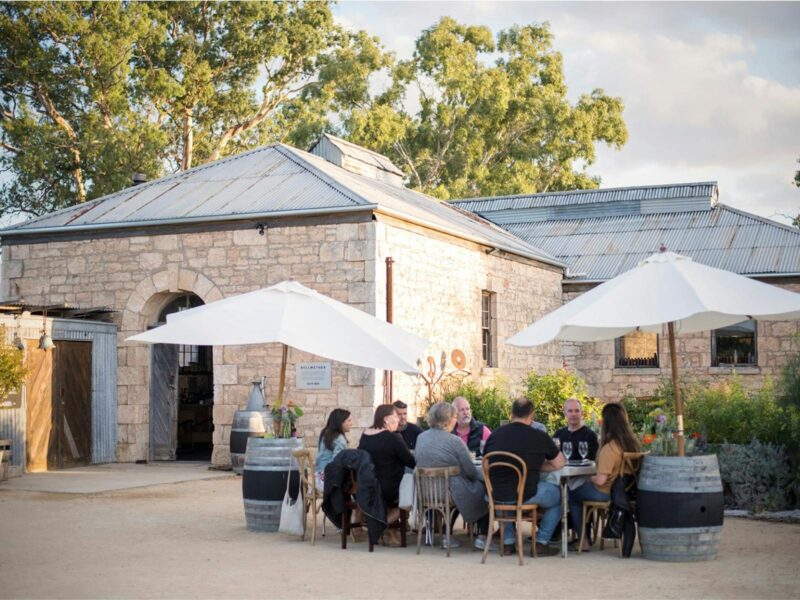 Seated wine tasting outside at Bellwether Wines