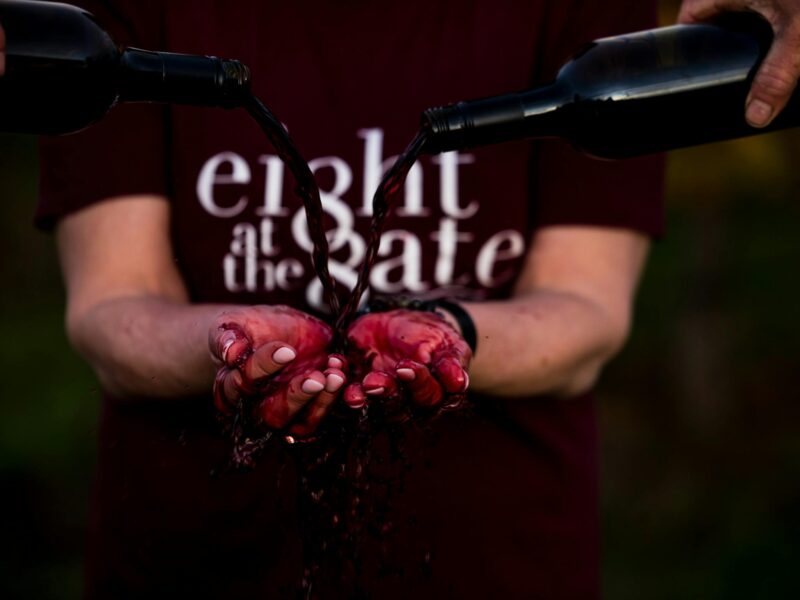 wine pouring over hands