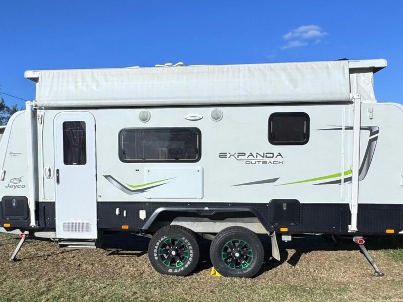 ATDW Bush To Beach Caravan Hire.jpeg Jayco Expanda Outback with pop top roof open and both beds open. Awning is not extended.