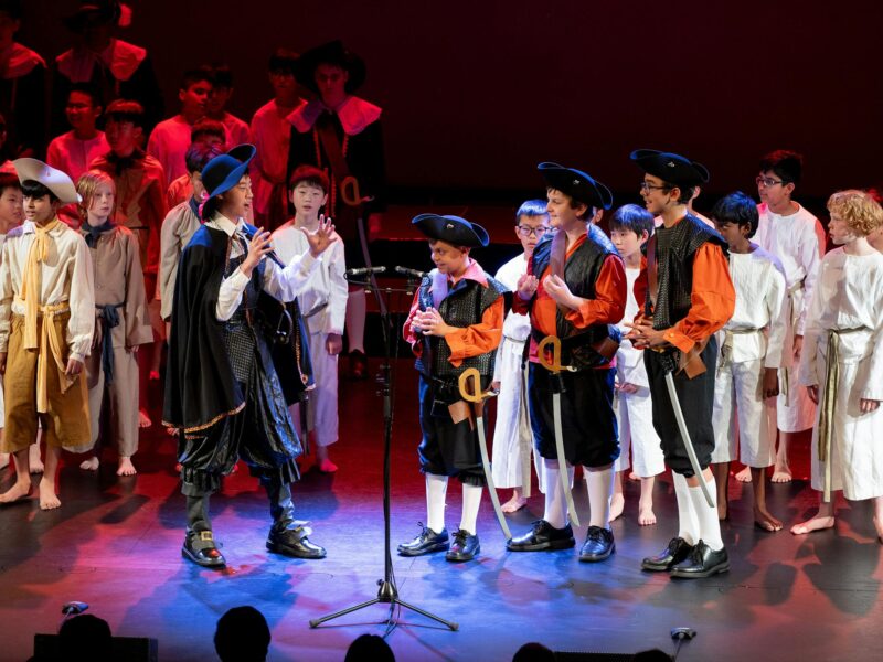 ATDW National Boys Choir Of Australia In Mt Gambier.jpeg Photo of boys signing dressed in costume