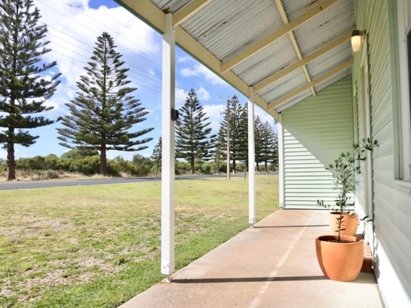 The front door and veranda of Norfolk Shack face Marine Parade, with no front fence.