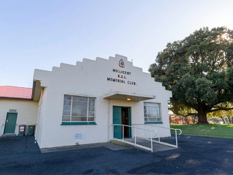 Cream coloured brick building with Millicent RSL Memorial Club written across the front.
