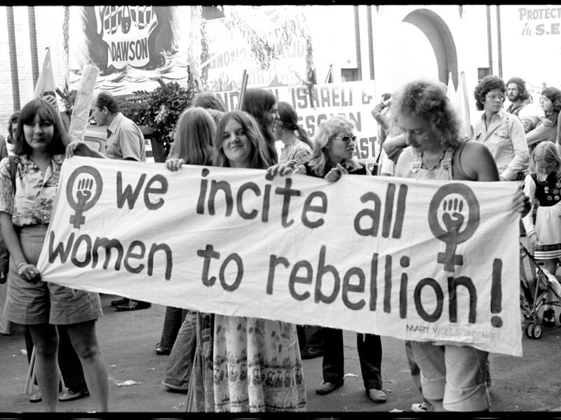 A black and white photograph from 1975 of a women's rights protest
