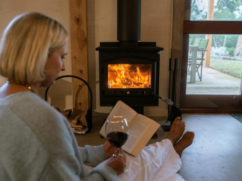 Inside fireplace, reading material, local wine supplied
